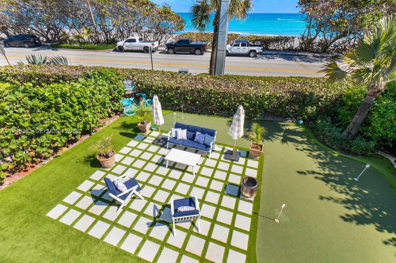 102 Xanadu Place Jupiter, FL 33477 - Photo 31 of 36 a garden view with a lake view