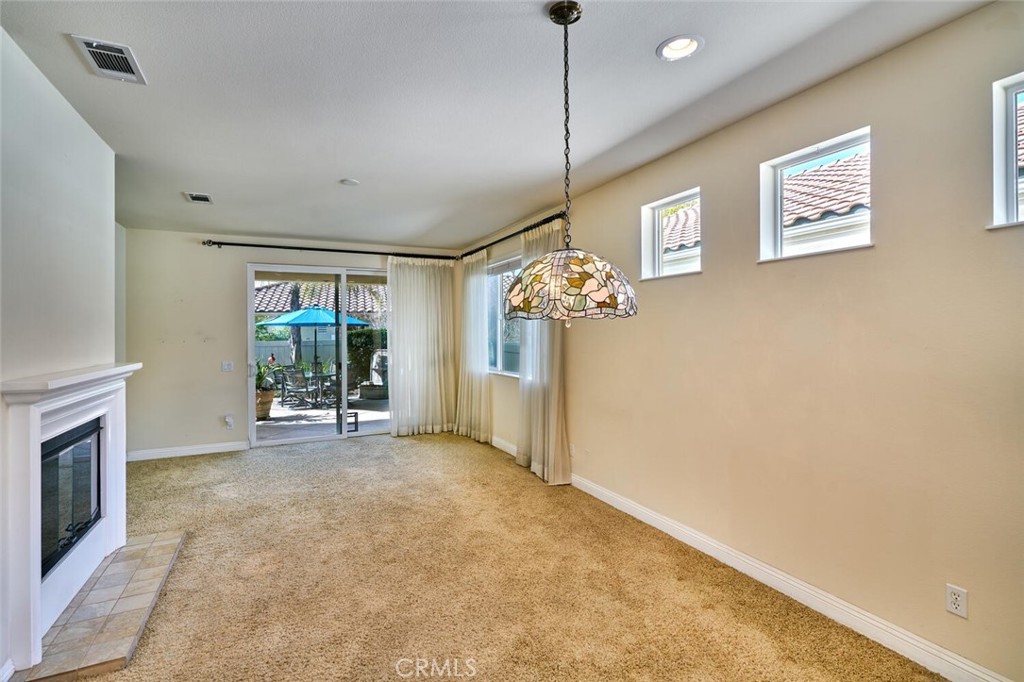1143 Saguara Road Beaumont, CA 92223 - Photo 32 of 66 a view of an empty room with a window