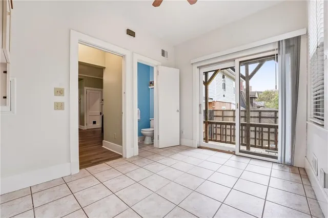 a view of empty room with windows