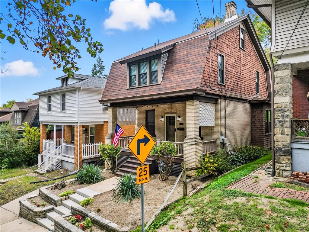 233 South Starr Avenue Pittsburgh, PA 15202 - Photo 2 of 43 a backyard of a house with seating space