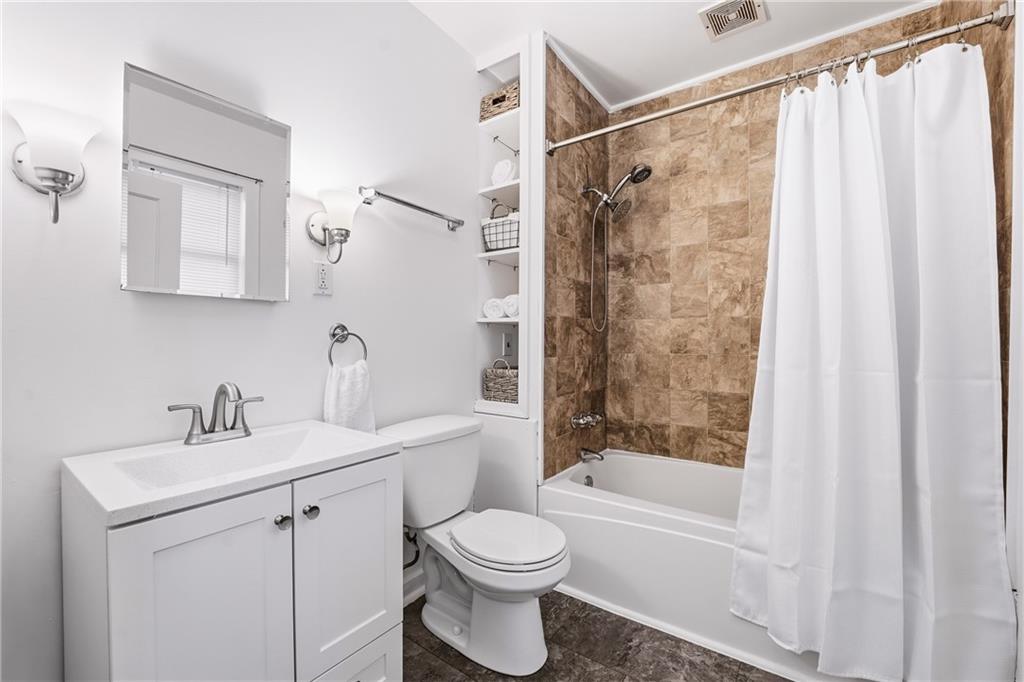 233 South Starr Avenue Pittsburgh, PA 15202 - Photo 28 of 43 a bathroom with a sink toilet and shower