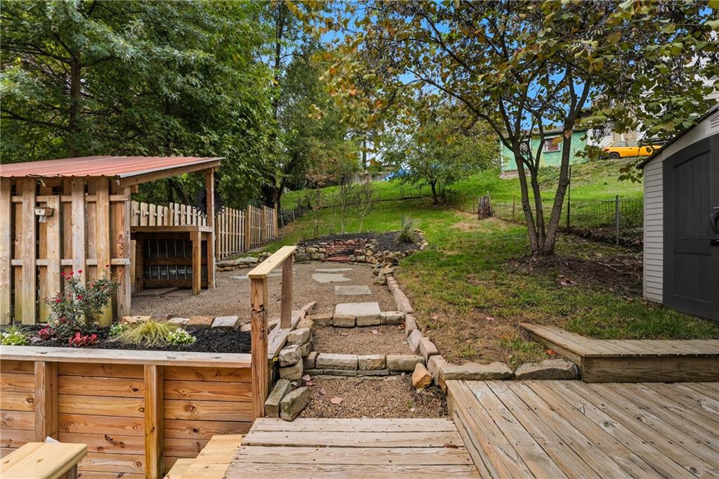 233 South Starr Avenue Pittsburgh, PA 15202 - Photo 34 of 43 a view of a patio with table and chairs with wooden floor and fence