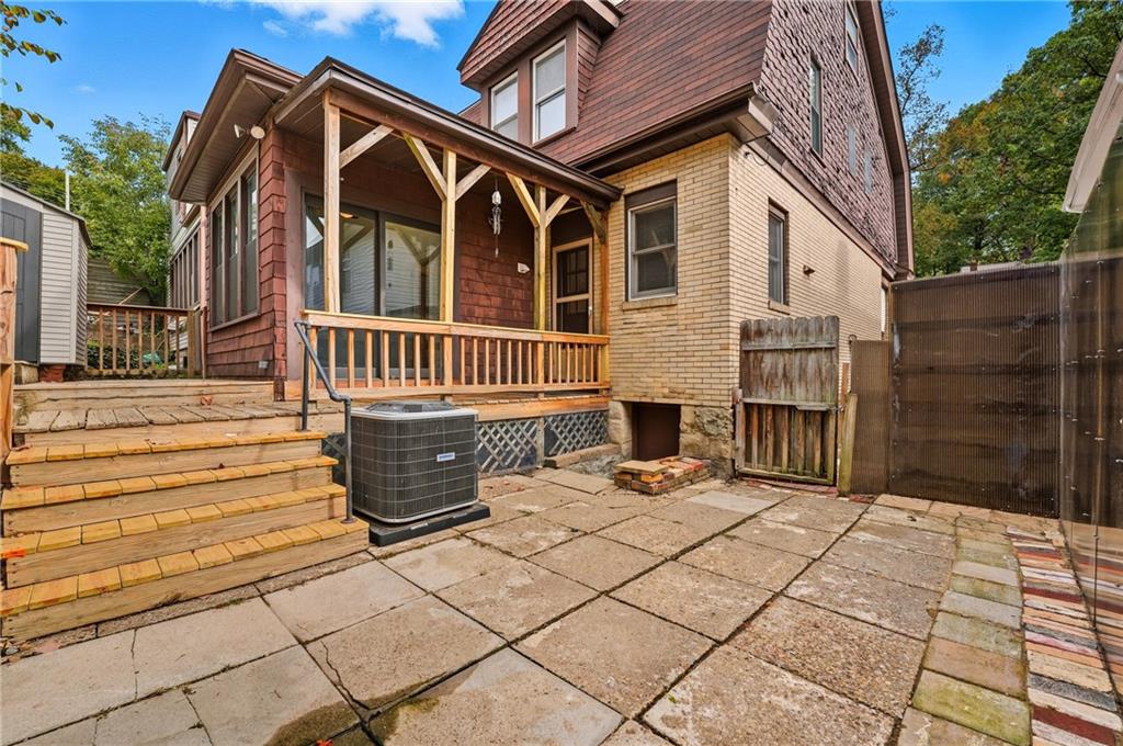 233 South Starr Avenue Pittsburgh, PA 15202 - Photo 39 of 43 a front view of a house with glass door and glass door