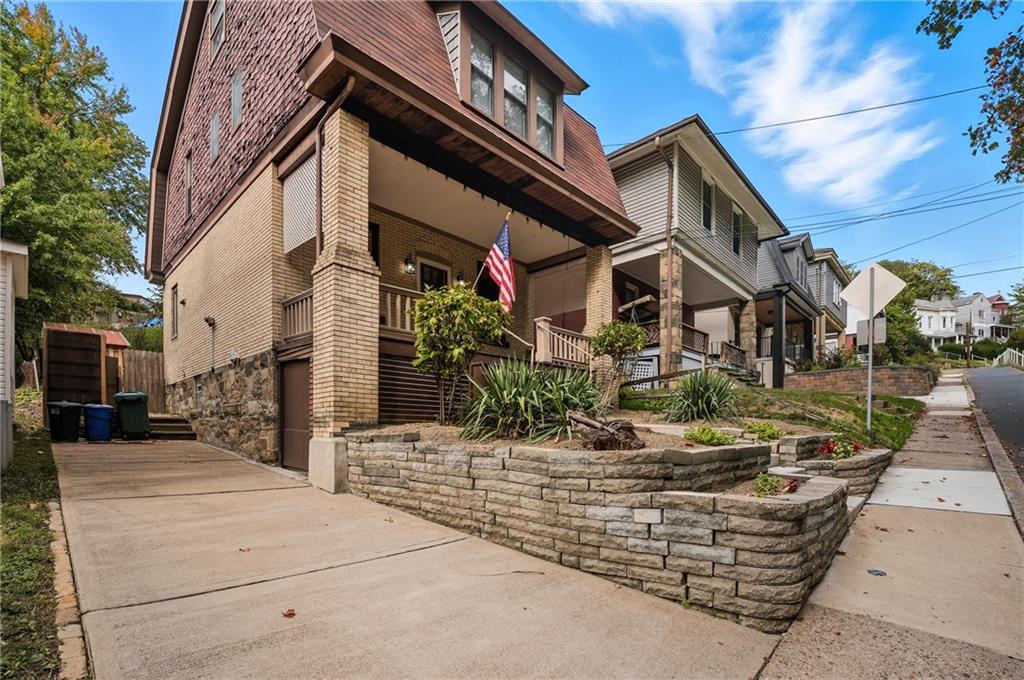 233 South Starr Avenue Pittsburgh, PA 15202 - Photo 41 of 43 a front view of a house with porch