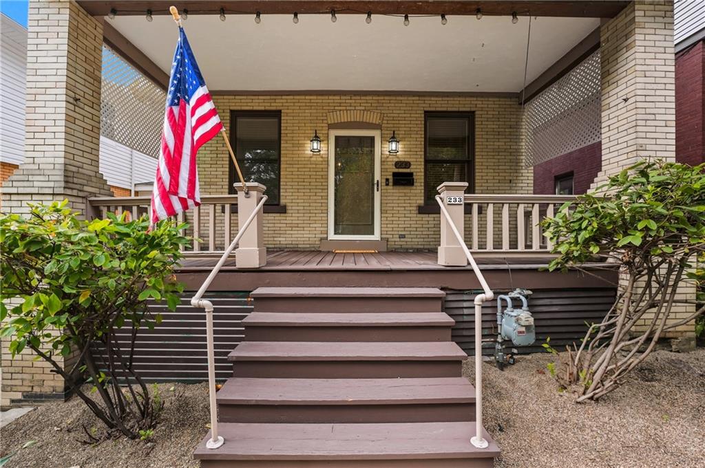 233 South Starr Avenue Pittsburgh, PA 15202 - Photo 6 of 43 a front view of a house with a staircase