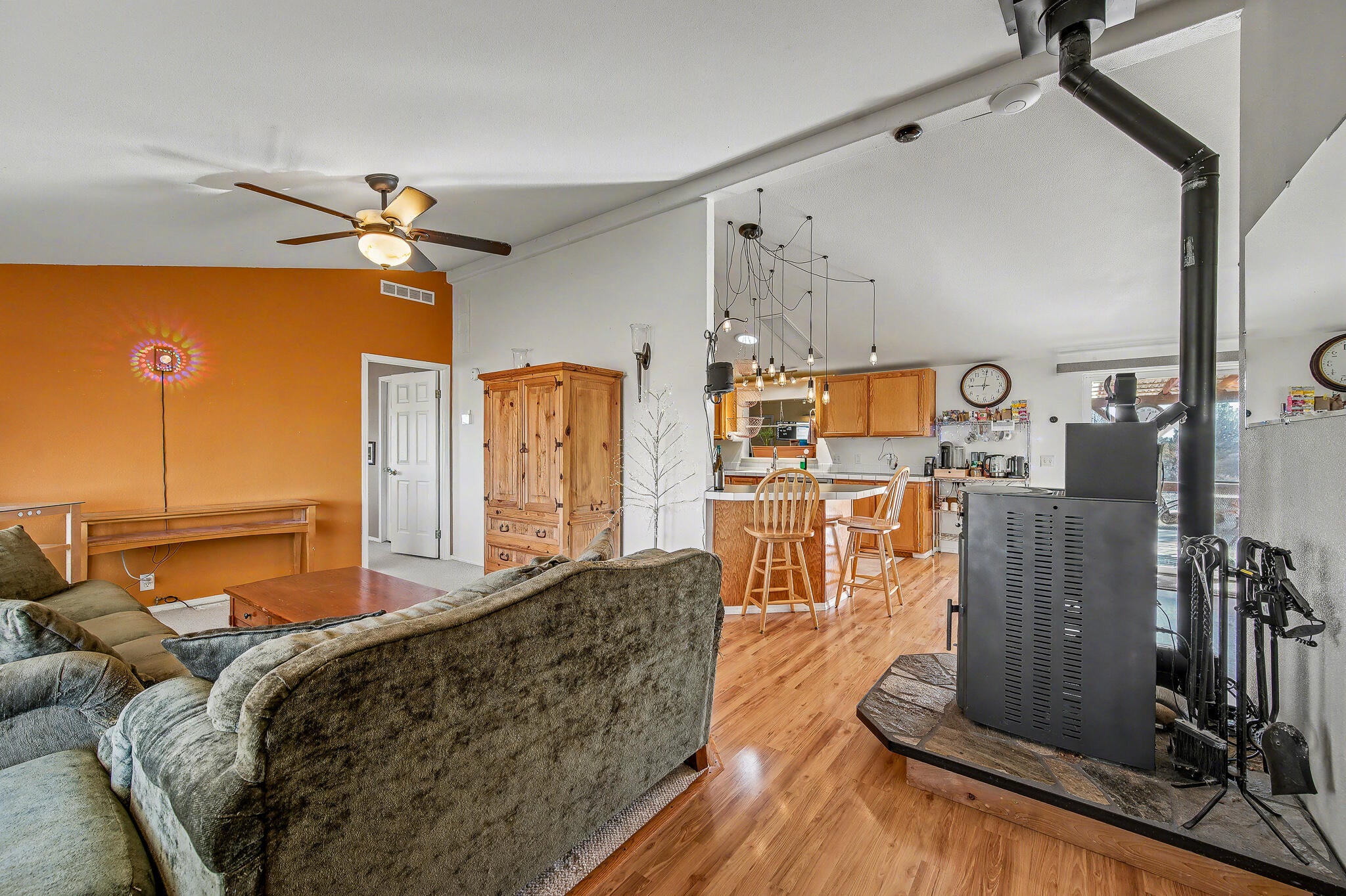 16065 Twin Lakes Road Powell Butte, OR 97753 - Photo 15 of 26 Living room pellet stove