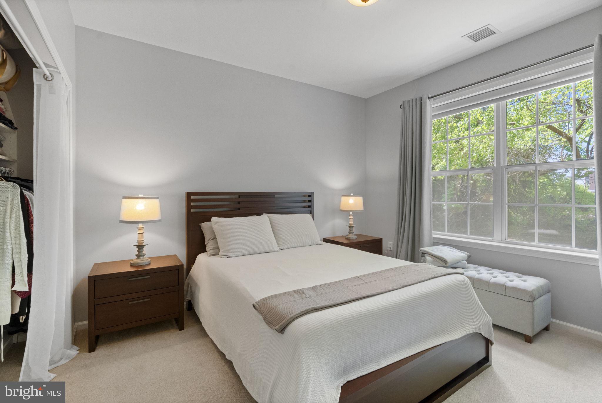 218 Timberlake Drive Ewing, NJ 08618 - Photo 11 of 30 a bedroom with a bed and a large window