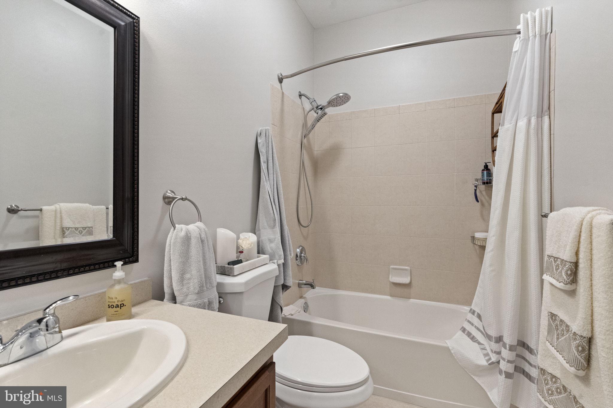 218 Timberlake Drive Ewing, NJ 08618 - Photo 13 of 30 a bathroom with a sink toilet and shower