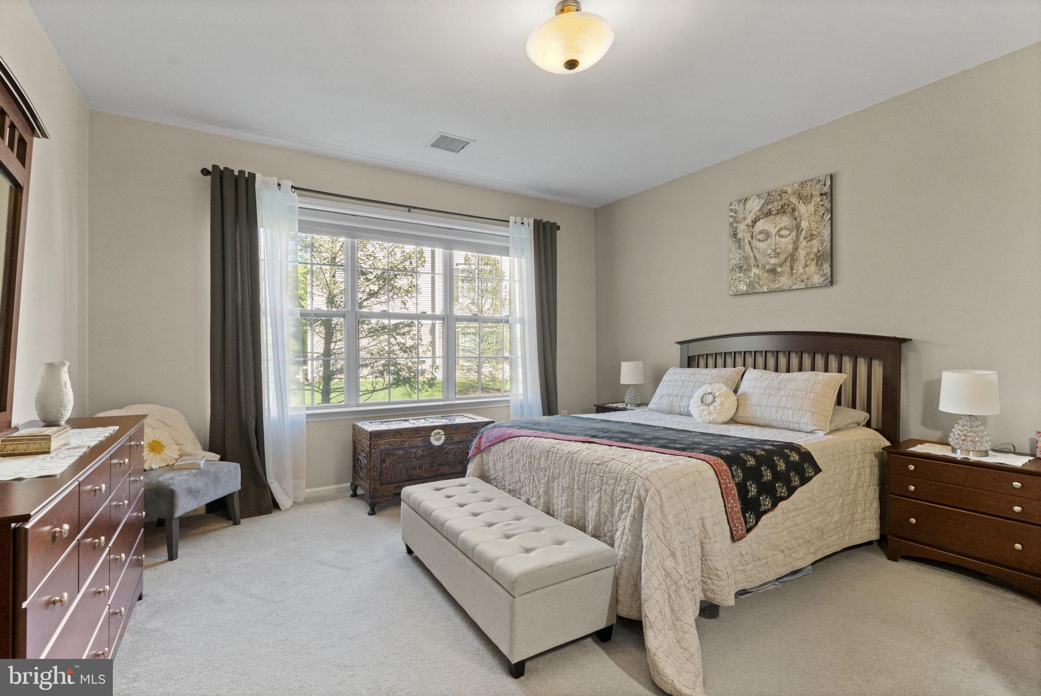 218 Timberlake Drive Ewing, NJ 08618 - Photo 14 of 30 a spacious bedroom with a bed and a window