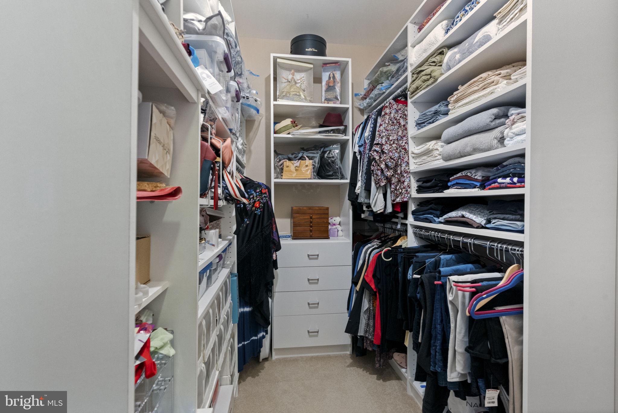 218 Timberlake Drive Ewing, NJ 08618 - Photo 15 of 30 a view of walk in closet with clothes and shoes