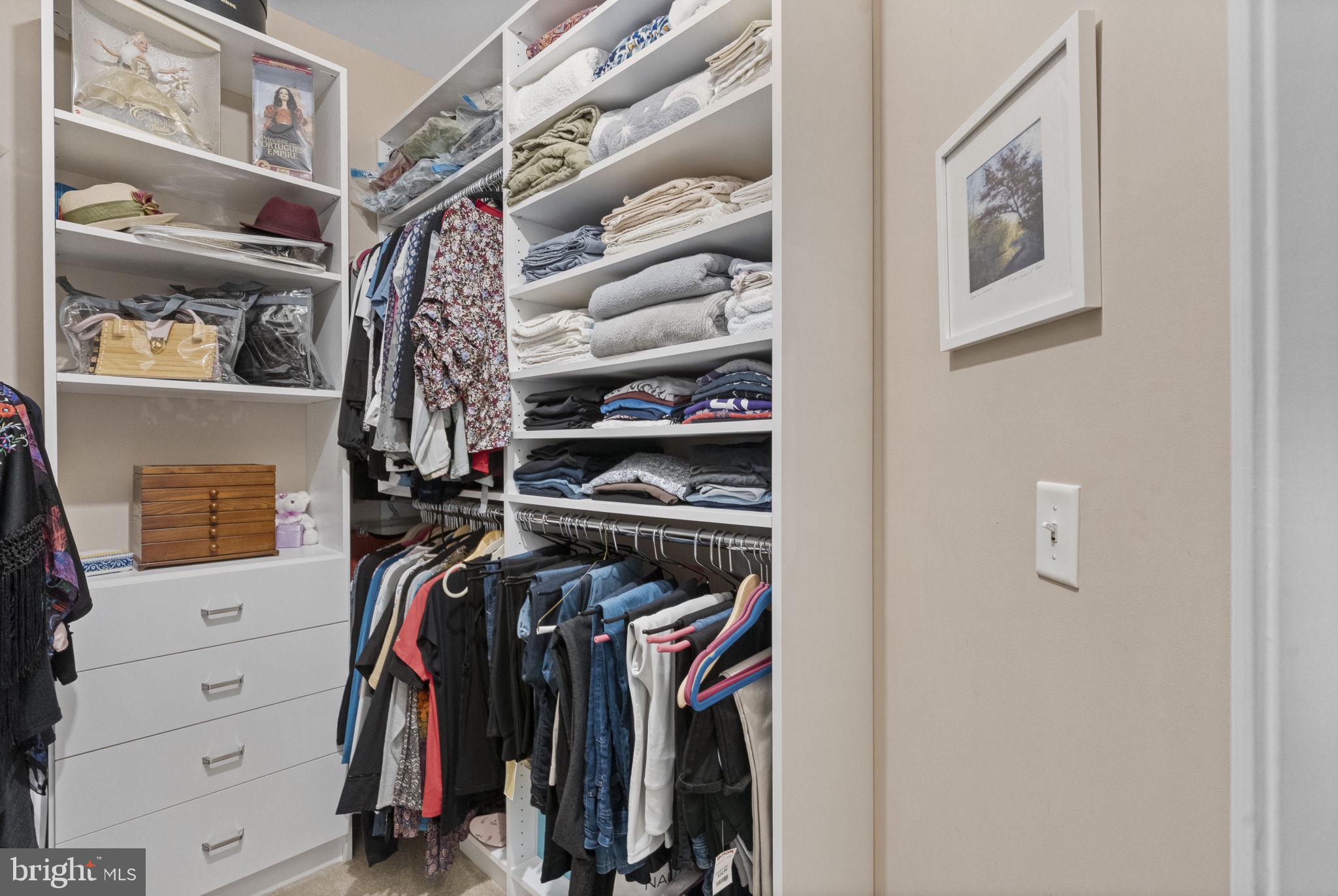 218 Timberlake Drive Ewing, NJ 08618 - Photo 16 of 30 a view of walk in closet with clothes and shoes