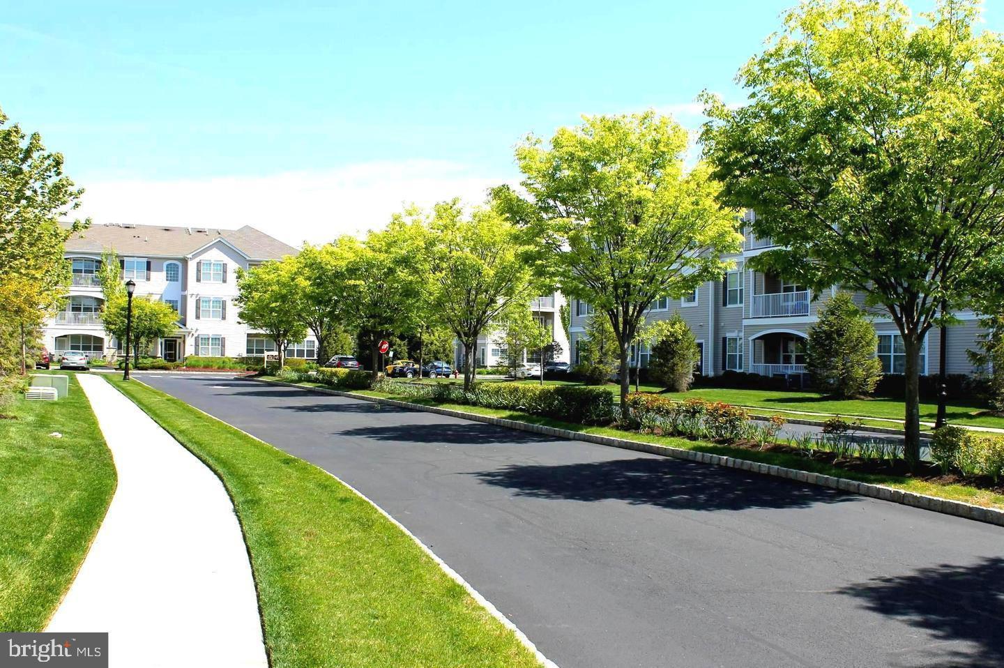 218 Timberlake Drive Ewing, NJ 08618 - Photo 26 of 30 a view of a street with houses on both side