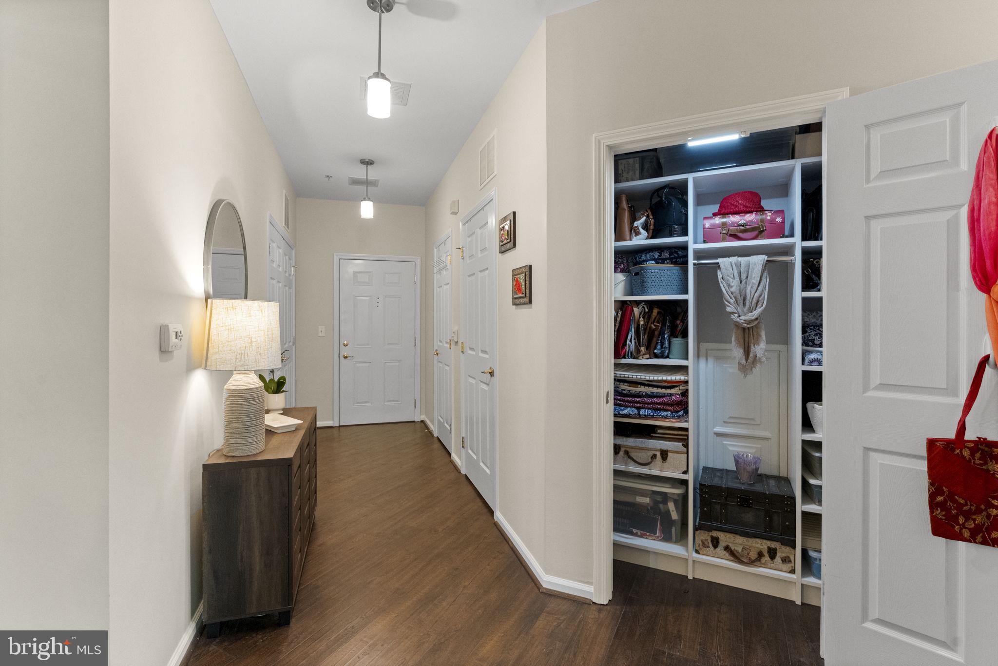 218 Timberlake Drive Ewing, NJ 08618 - Photo 10 of 30 a view of a hallway with wooden floor and closet