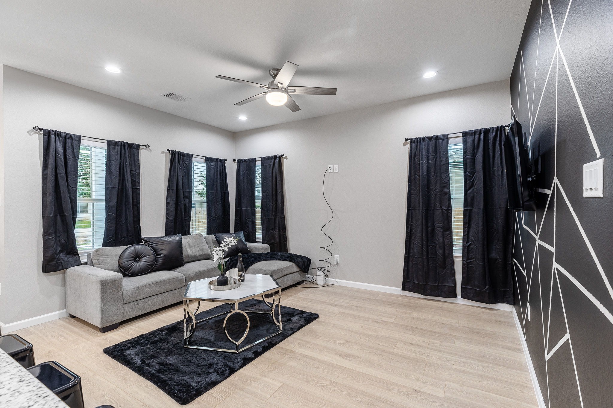 4661 Clover Street, Unit B Houston, TX 77051 - Photo 5 of 26 a living room with furniture and a large window