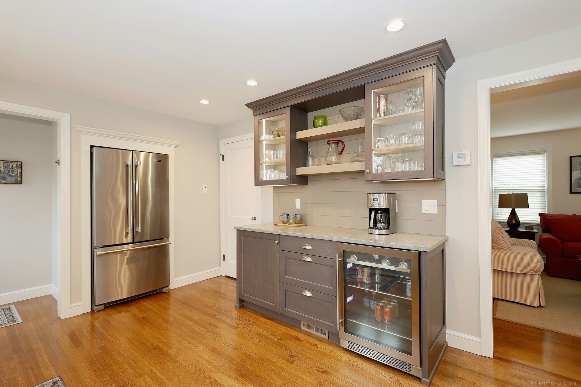 100 Overhill Road Fairfield, CT 06824 - Photo 12 of 40 a kitchen with stainless steel appliances granite countertop a refrigerator and a stove top oven