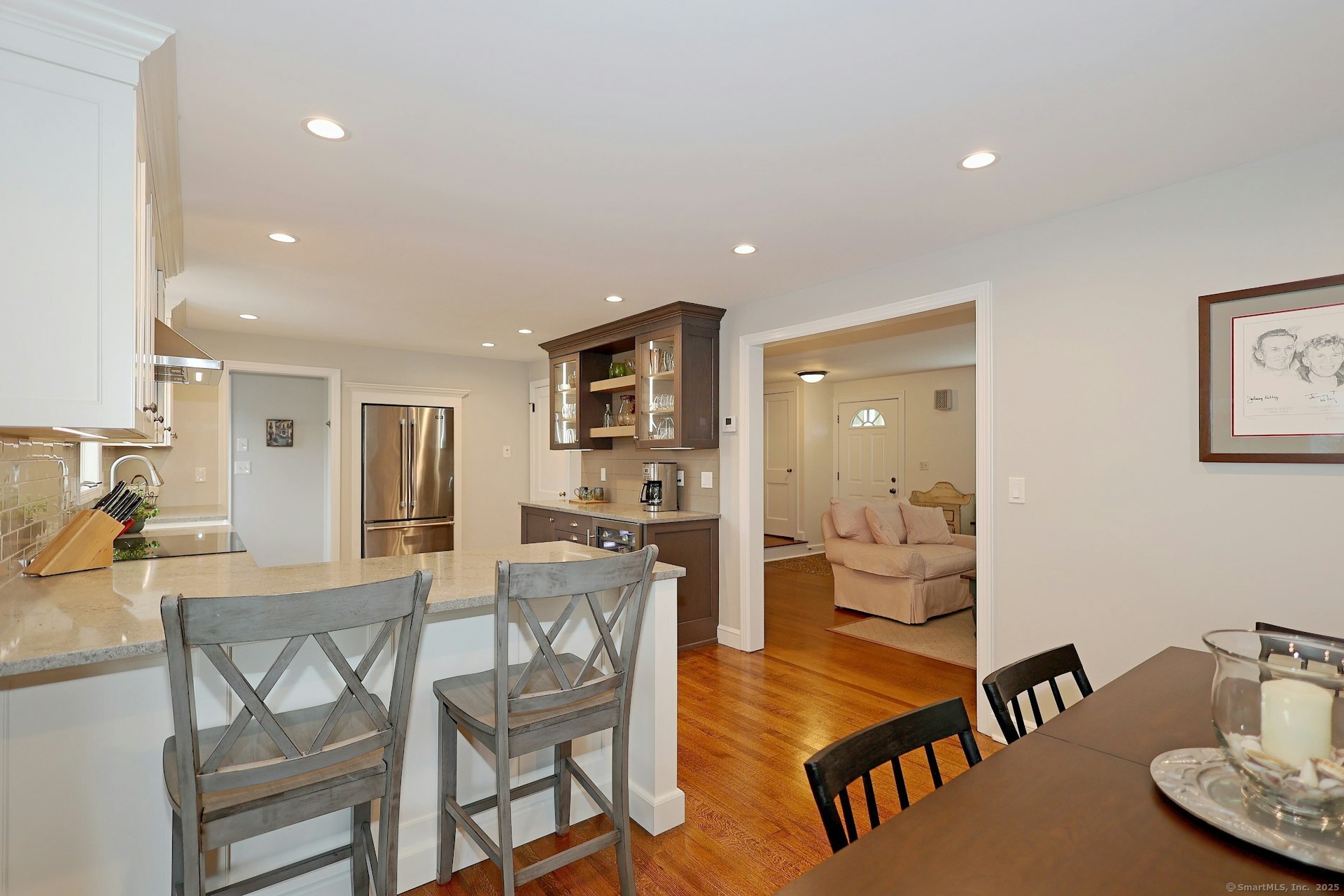 100 Overhill Road Fairfield, CT 06824 - Photo 13 of 40 a view of a dining room with furniture and wooden floor