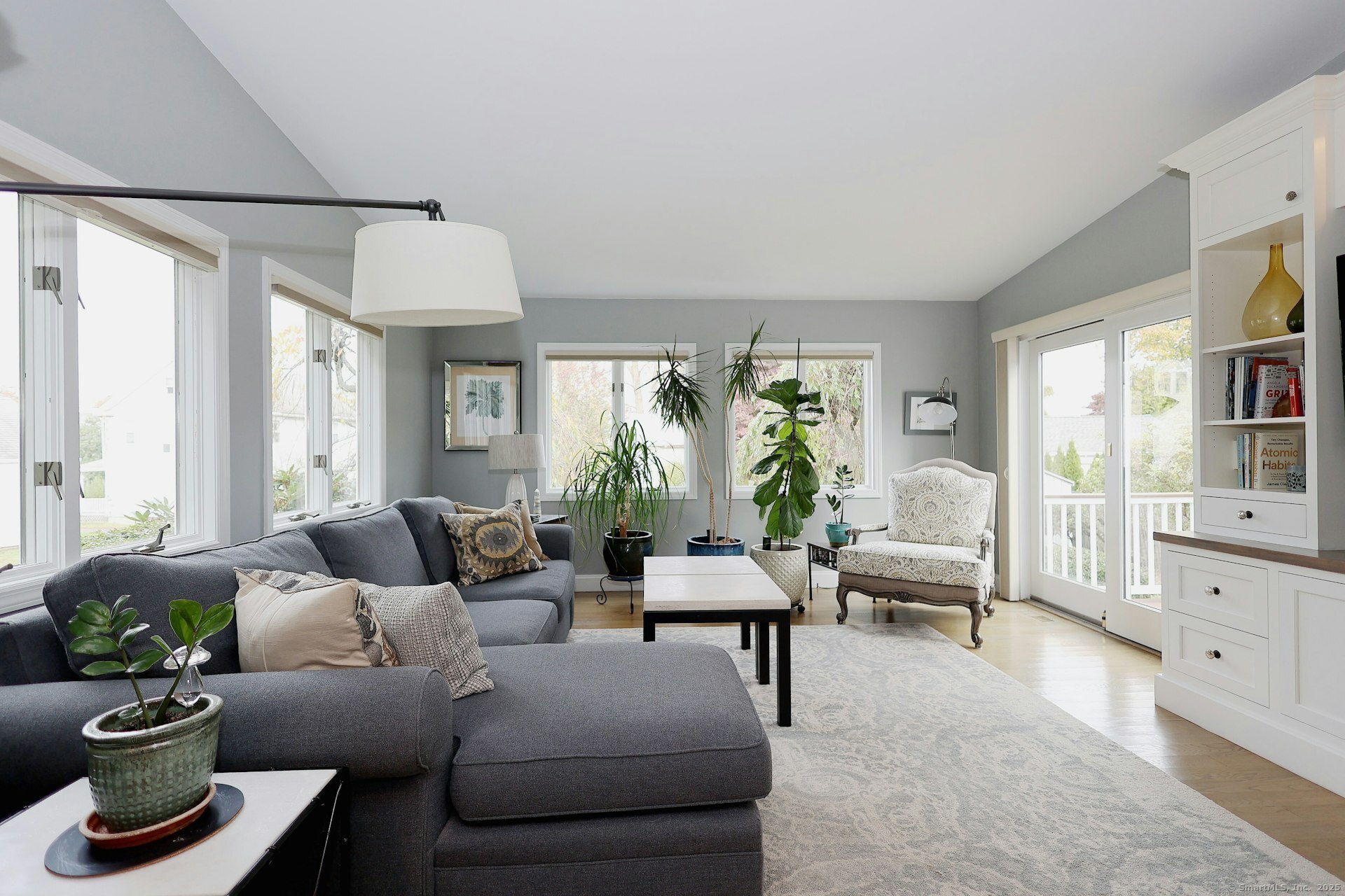 100 Overhill Road Fairfield, CT 06824 - Photo 15 of 40 a living room with furniture and a potted plant