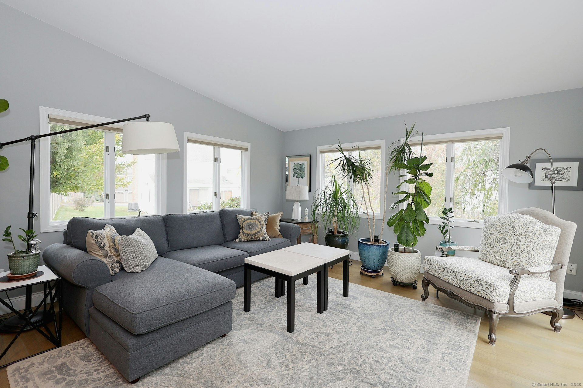 100 Overhill Road Fairfield, CT 06824 - Photo 17 of 40 a living room with furniture and a large window