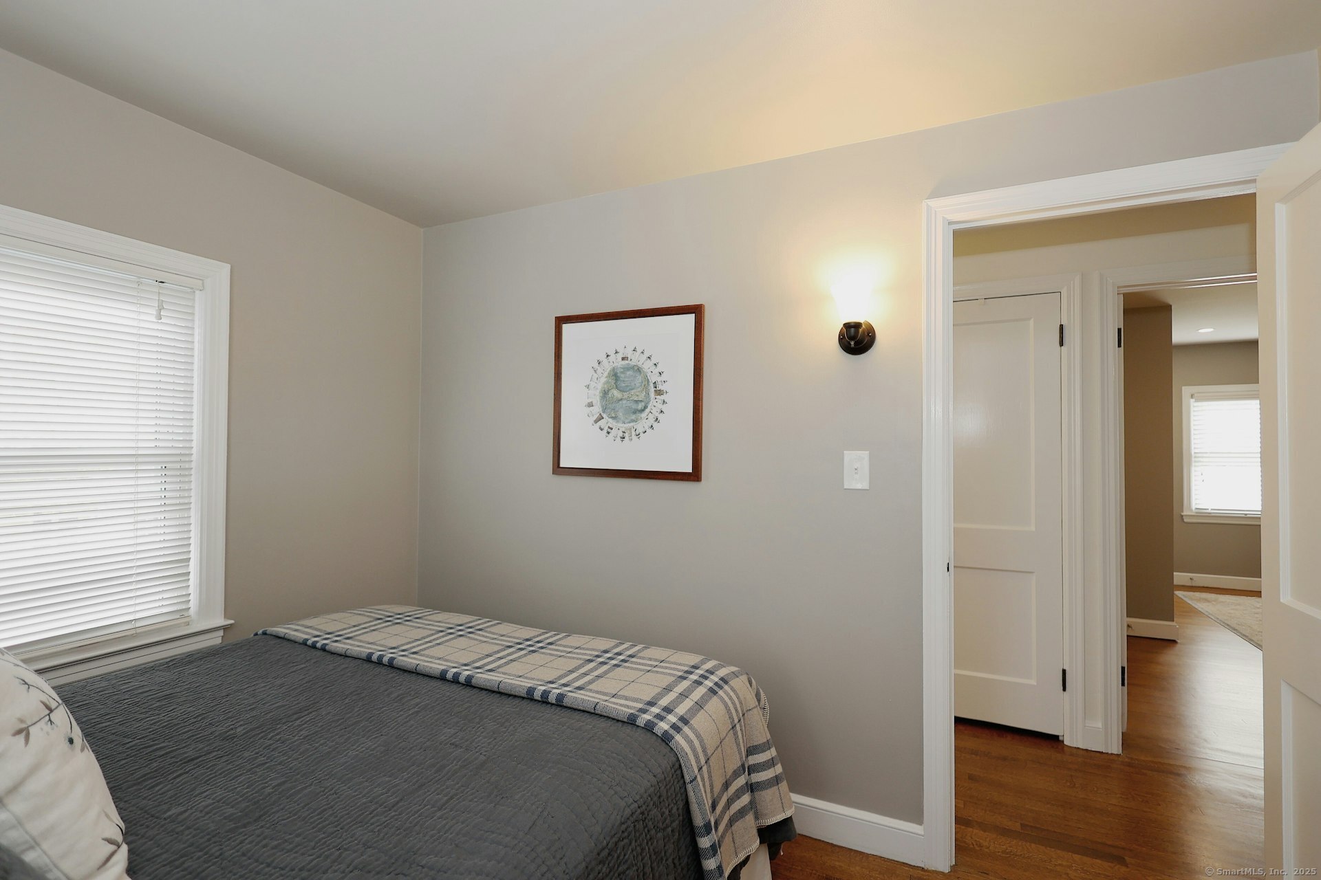 100 Overhill Road Fairfield, CT 06824 - Photo 31 of 40 a bedroom with a bed and wooden floor