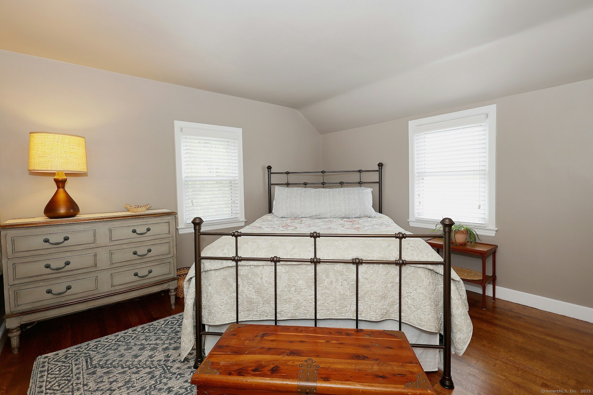 100 Overhill Road Fairfield, CT 06824 - Photo 35 of 40 a bedroom with a bed a lamp and a window