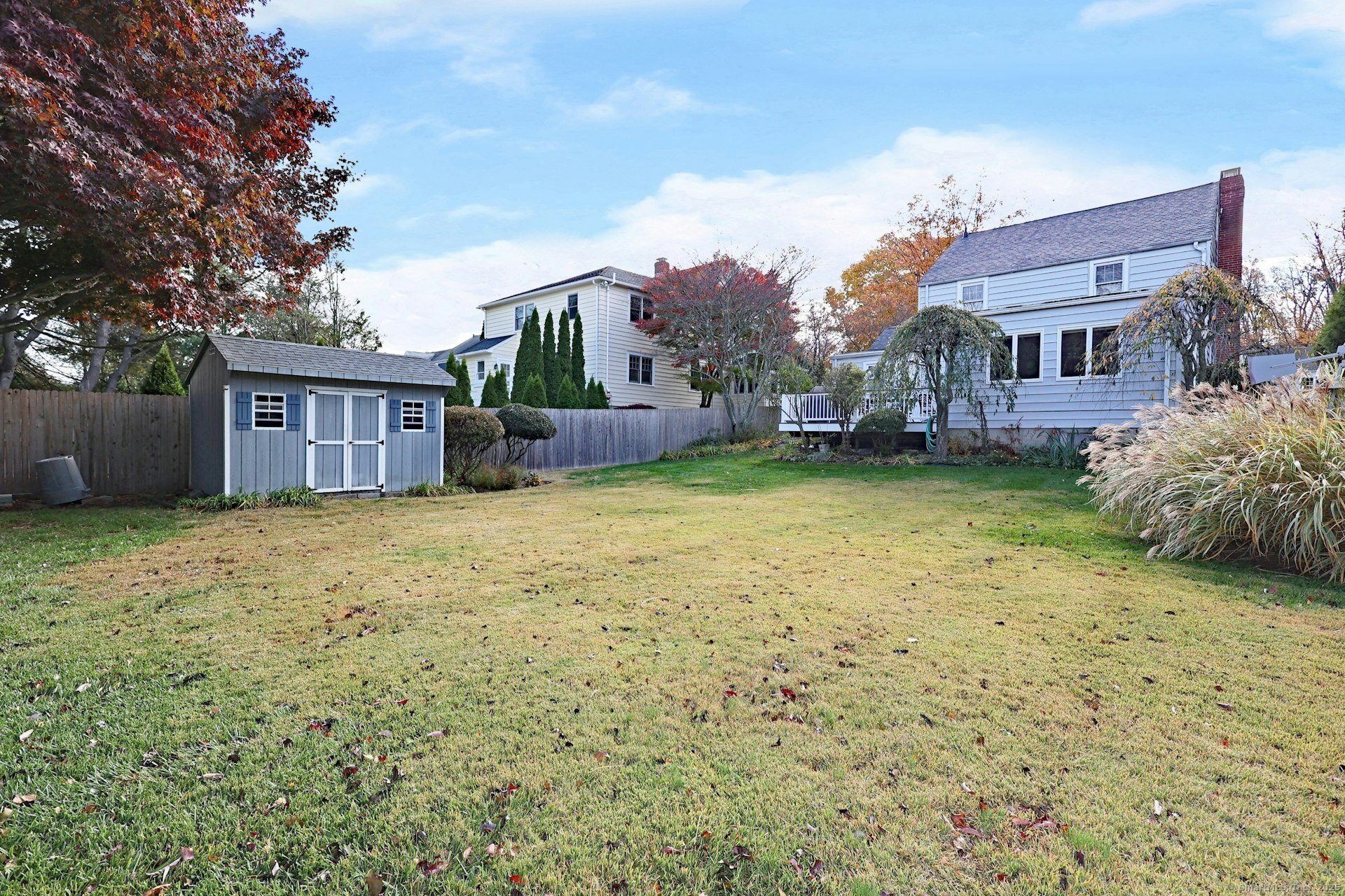 100 Overhill Road Fairfield, CT 06824 - Photo 39 of 40 a view of a house with a yard and sitting area
