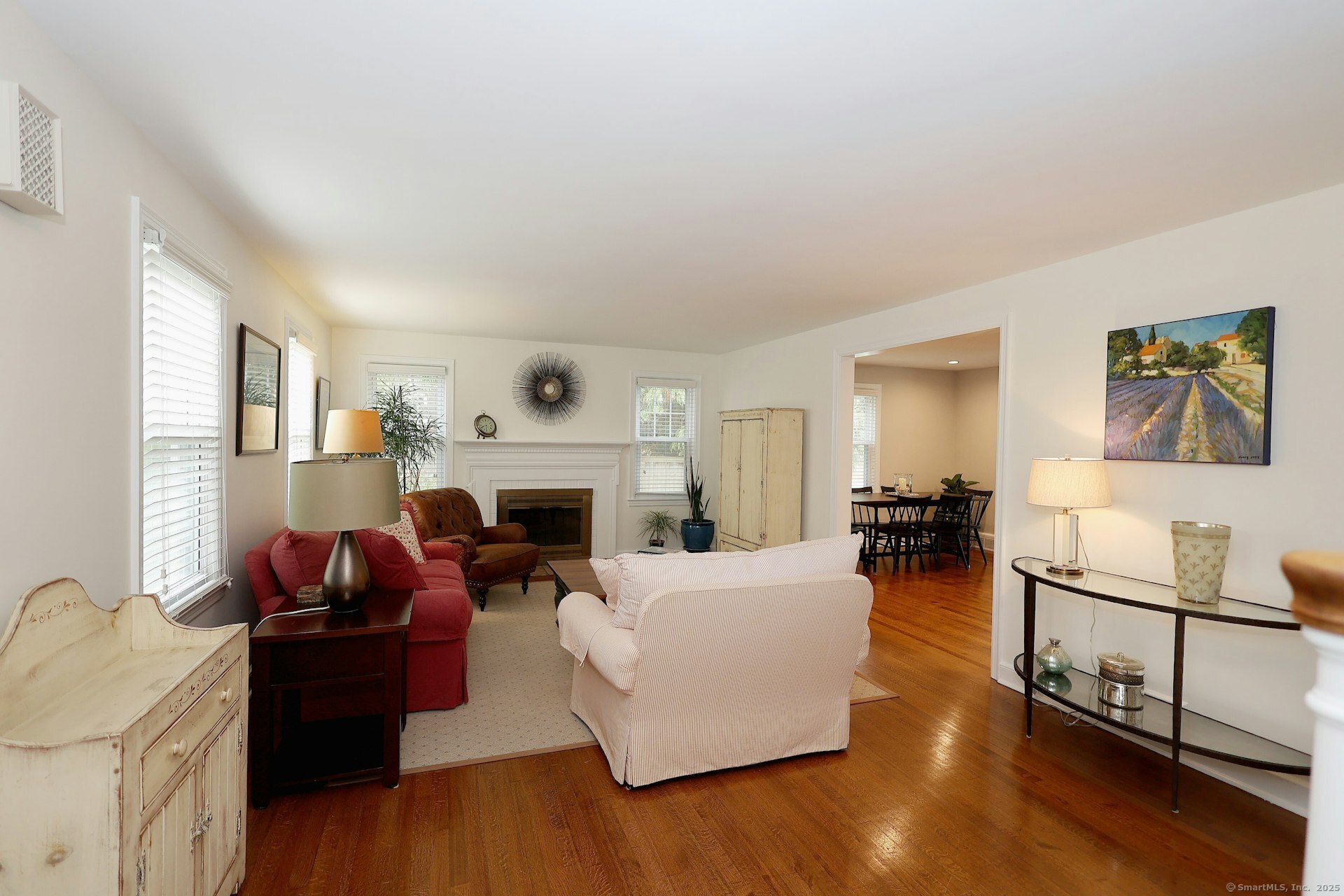 100 Overhill Road Fairfield, CT 06824 - Photo 4 of 40 a living room with furniture and a fireplace