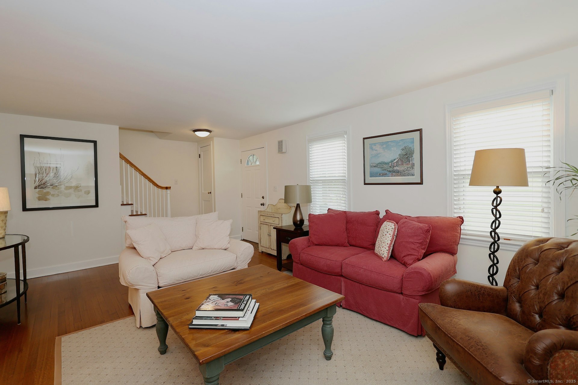 100 Overhill Road Fairfield, CT 06824 - Photo 6 of 40 a living room with furniture a couch and wooden floor