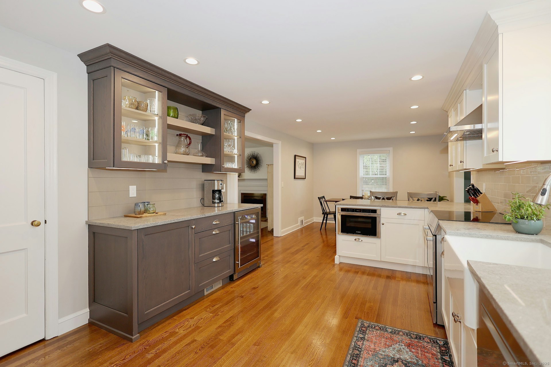 100 Overhill Road Fairfield, CT 06824 - Photo 10 of 40 a large kitchen with stainless steel appliances granite countertop a lot of counter space and wooden floors
