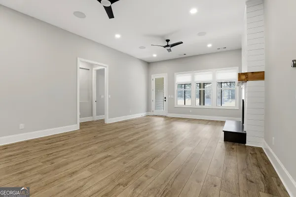 a kitchen with granite countertop a stove and a sink
