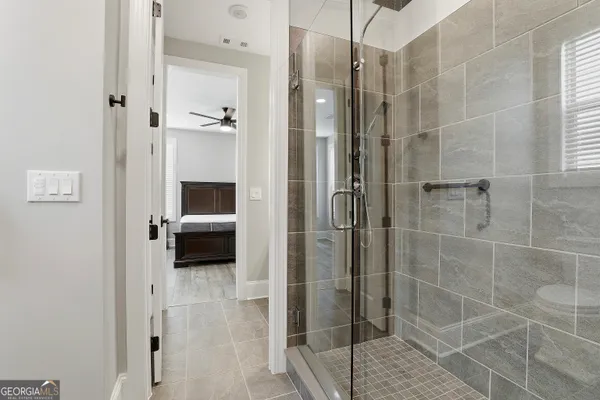 a bathroom with a sink toilet vanity and bathtub