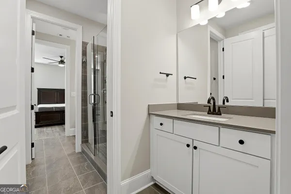 a front view of houses with yard