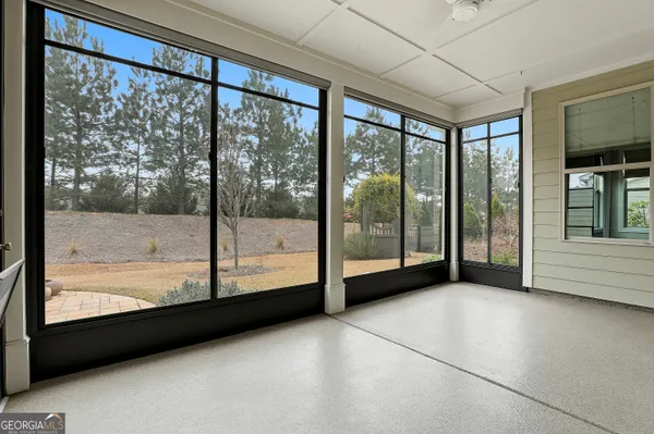 a view of balcony with wooden floor