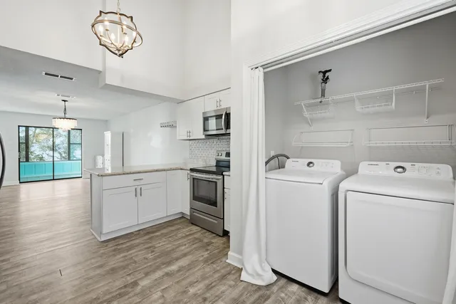 a view of a hallway with staircase