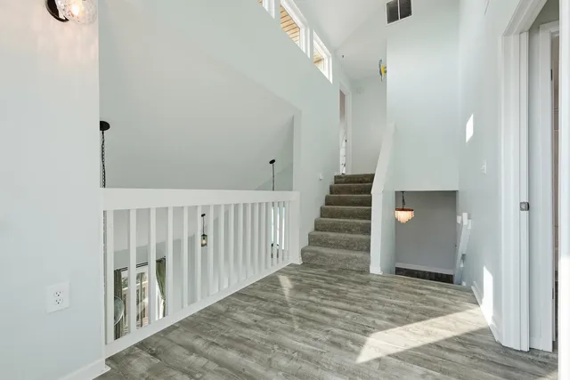 a view of a livingroom with an empty space and a window