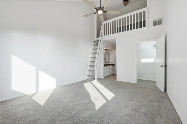 a view of a room that has a large window