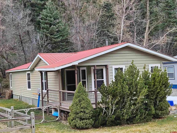 a house that has a lot of plants in it