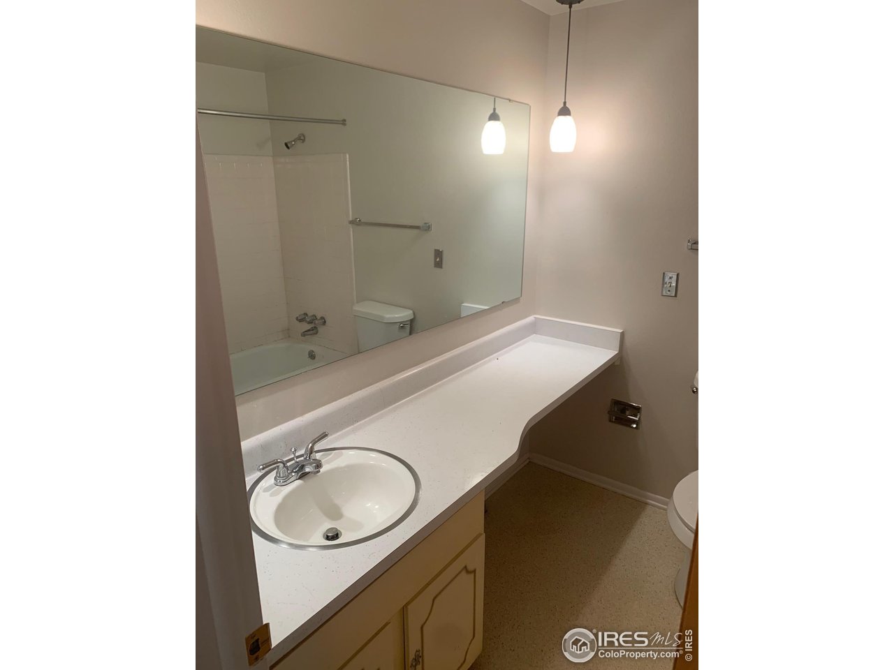 3310 Everett Drive Boulder, CO 80305 - Photo 14 of 17 a bathroom with a sink and a mirror