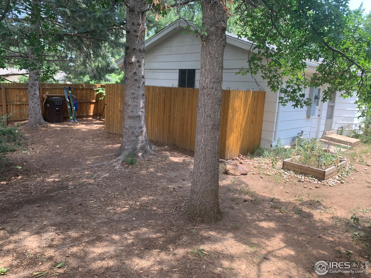 3310 Everett Drive Boulder, CO 80305 - Photo 4 of 17 a backyard of a house with seating space
