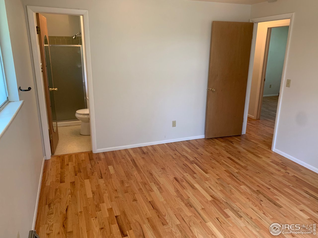 3310 Everett Drive Boulder, CO 80305 - Photo 9 of 17 a view of a room with wooden floor and a small space