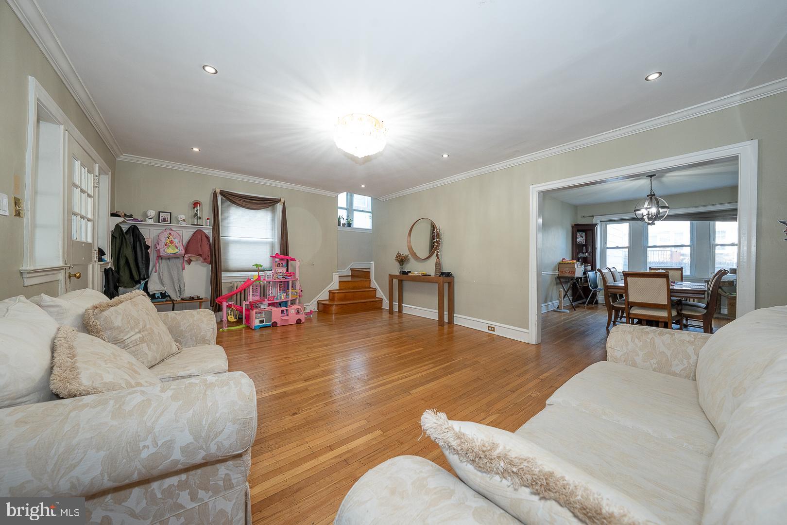 122 Crestview Road Upper Darby, PA 19082 - Photo 13 of 46 a living room with furniture and wooden floor