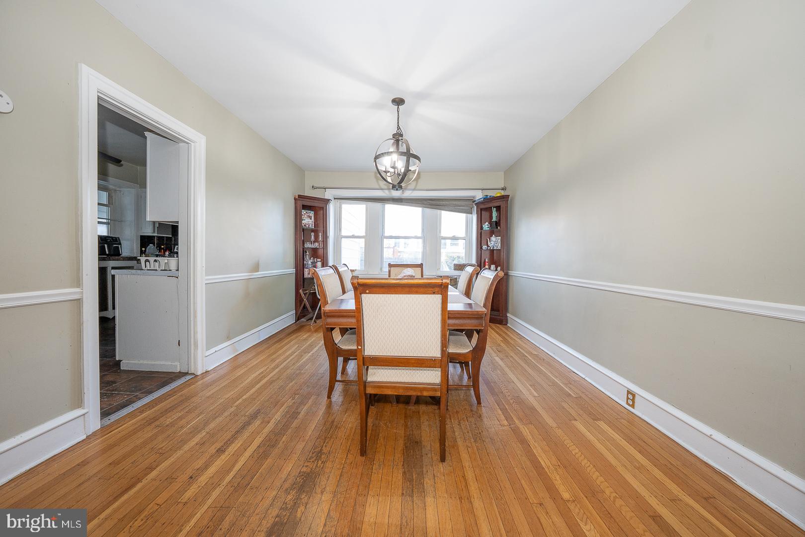 122 Crestview Road Upper Darby, PA 19082 - Photo 14 of 46 a view of a dining room with furniture window and wooden floor