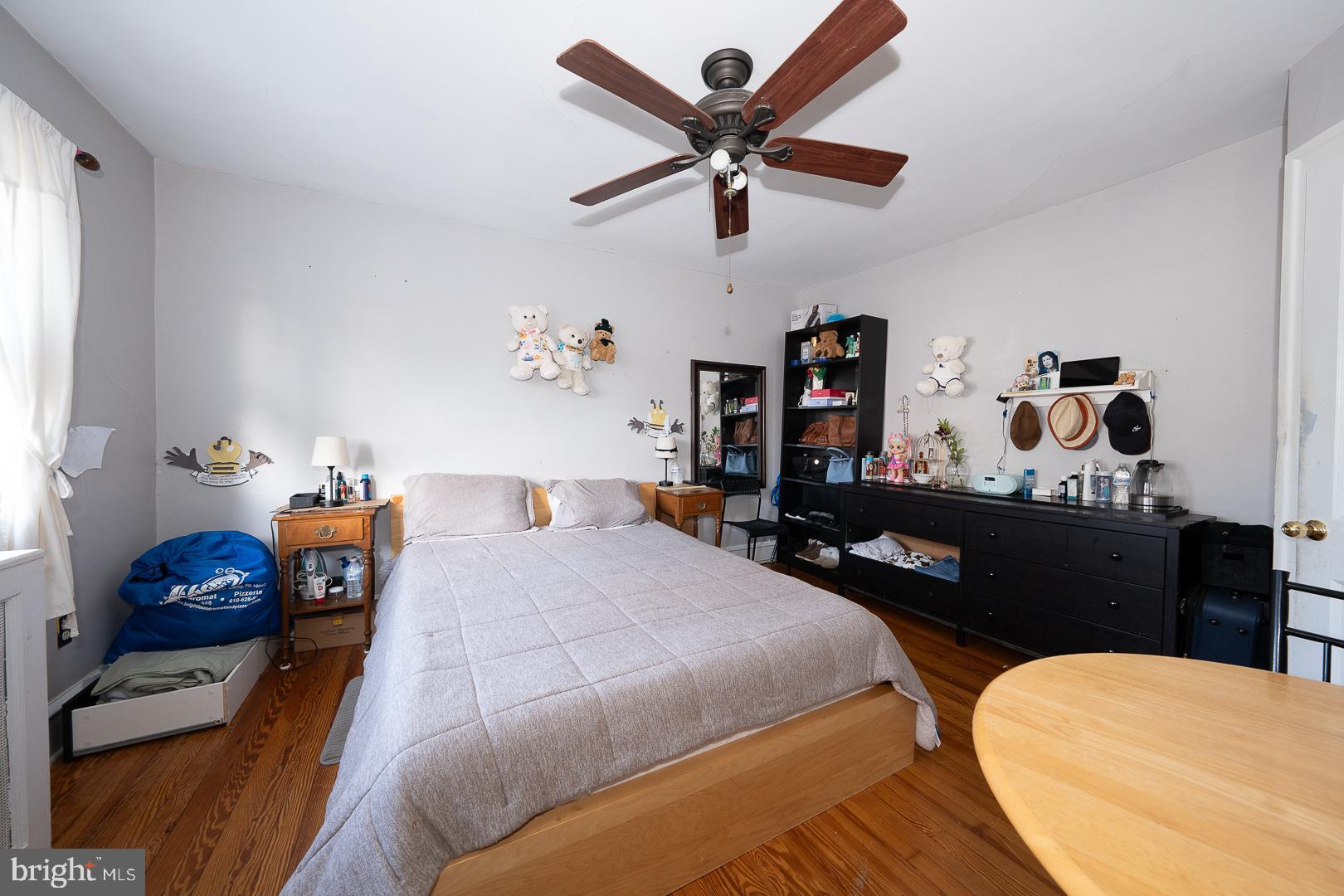 122 Crestview Road Upper Darby, PA 19082 - Photo 27 of 46 a bedroom with a bed gym equipment and a window