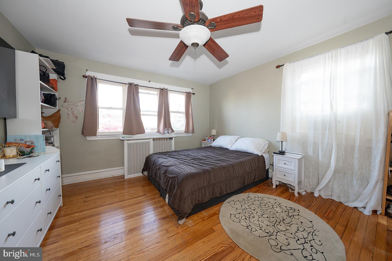 122 Crestview Road Upper Darby, PA 19082 - Photo 30 of 46 a bedroom with double bed and a window