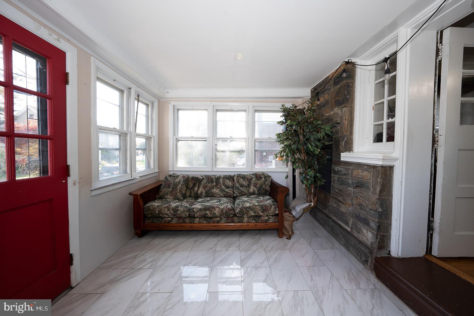 122 Crestview Road Upper Darby, PA 19082 - Photo 3 of 46 a bedroom with a bed chair and window
