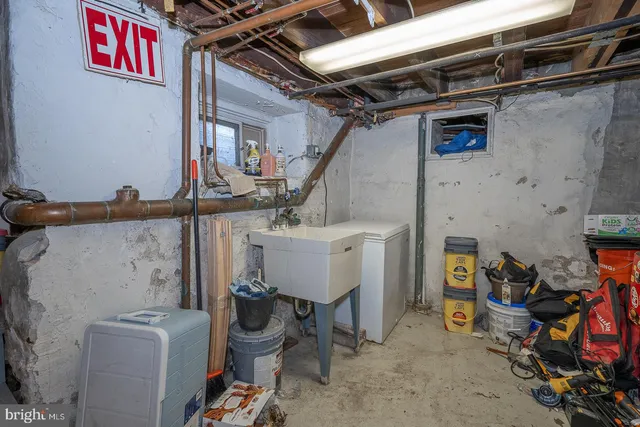a view of a utility room with closet