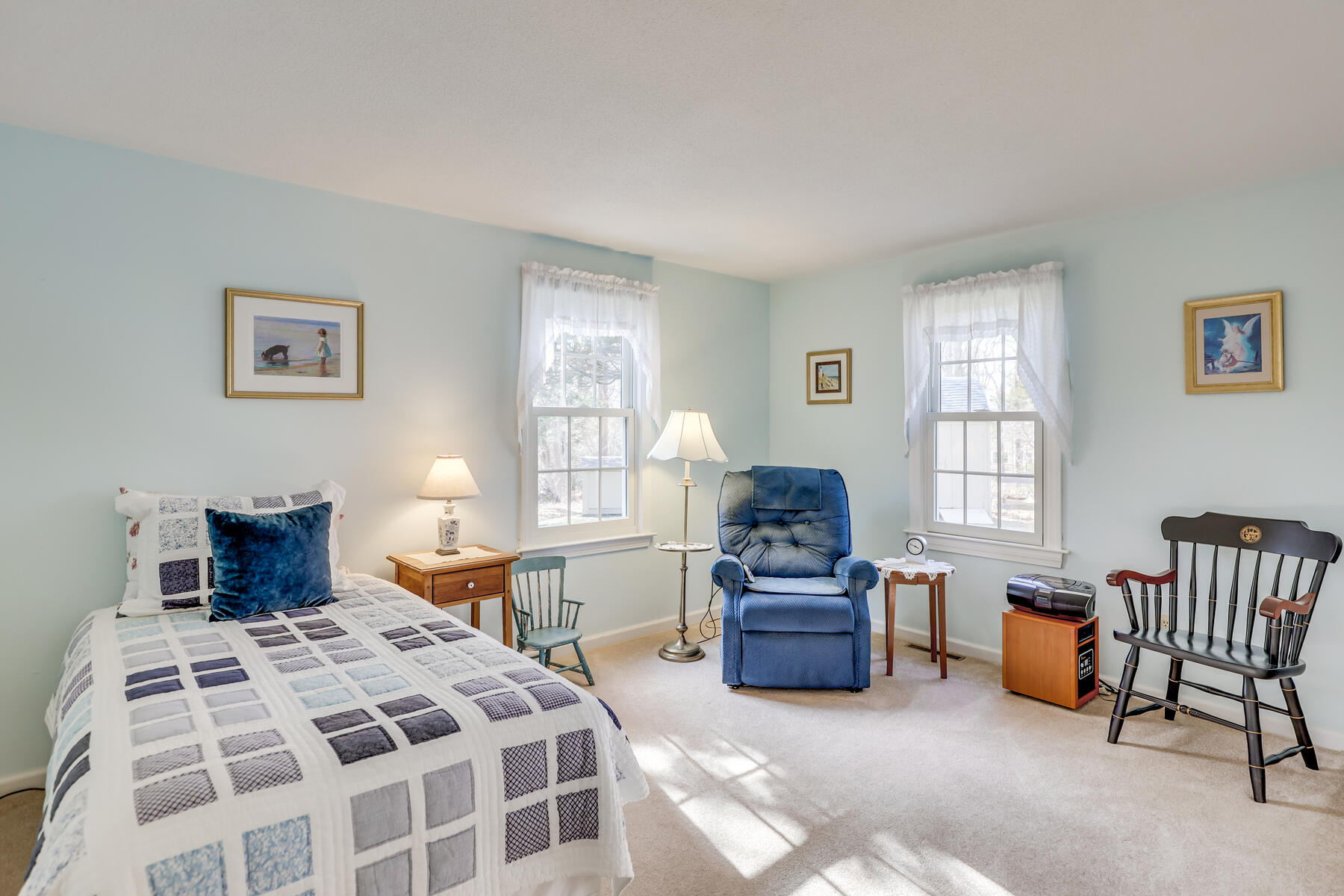 84 Beach Road Orleans, MA 02653 - Photo 16 of 45 a bedroom with a bed and a window