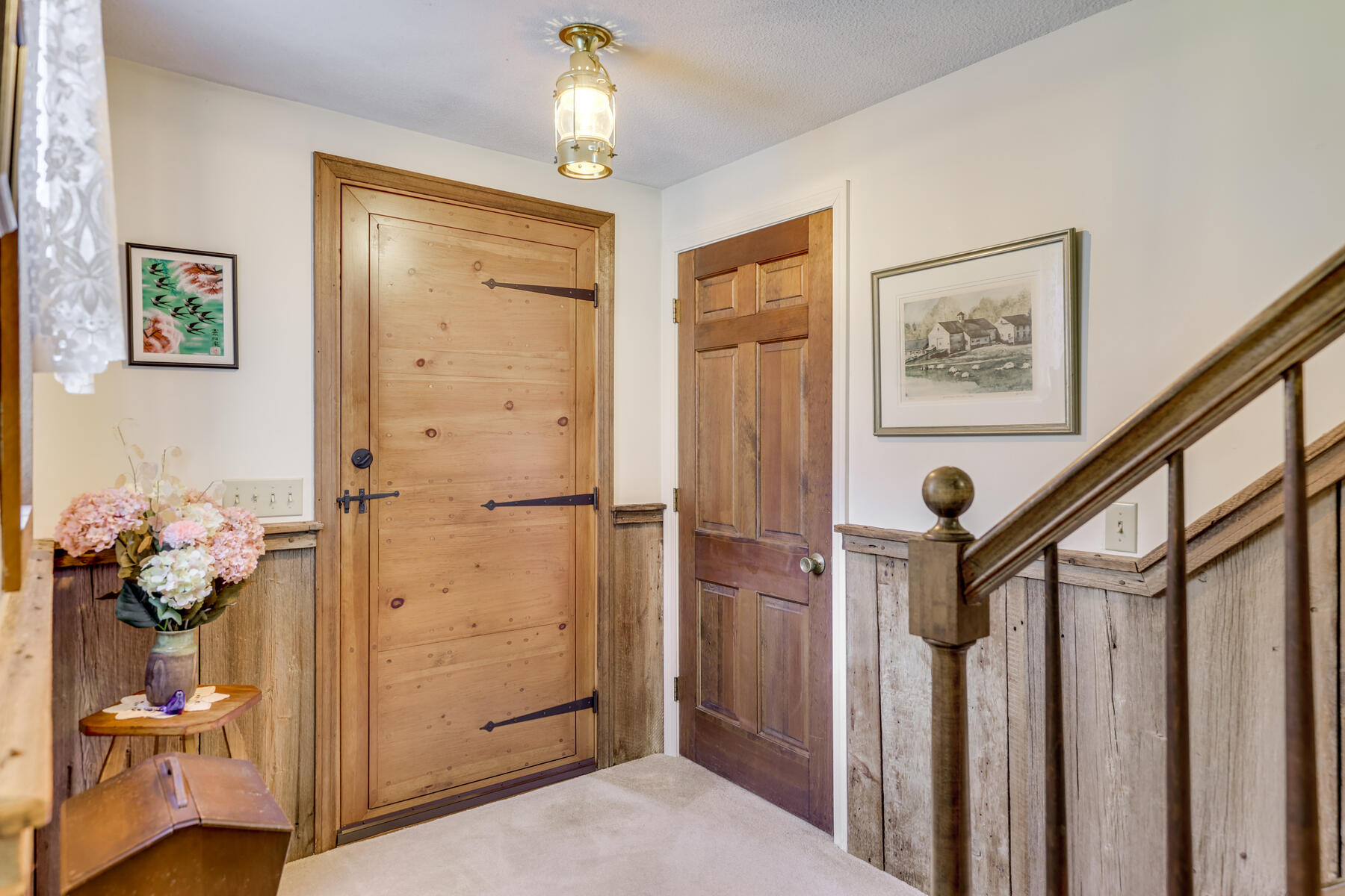 84 Beach Road Orleans, MA 02653 - Photo 17 of 45 a view of a hallway with wooden floor and entryway