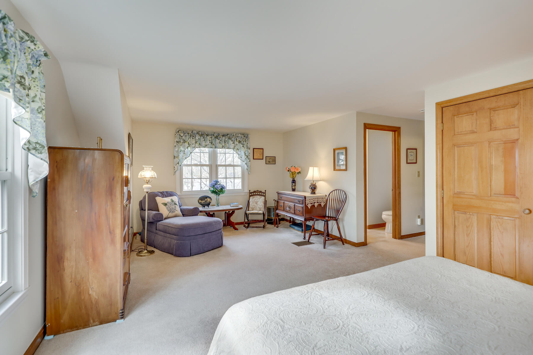 84 Beach Road Orleans, MA 02653 - Photo 21 of 45 a living room with furniture window and a refrigerator