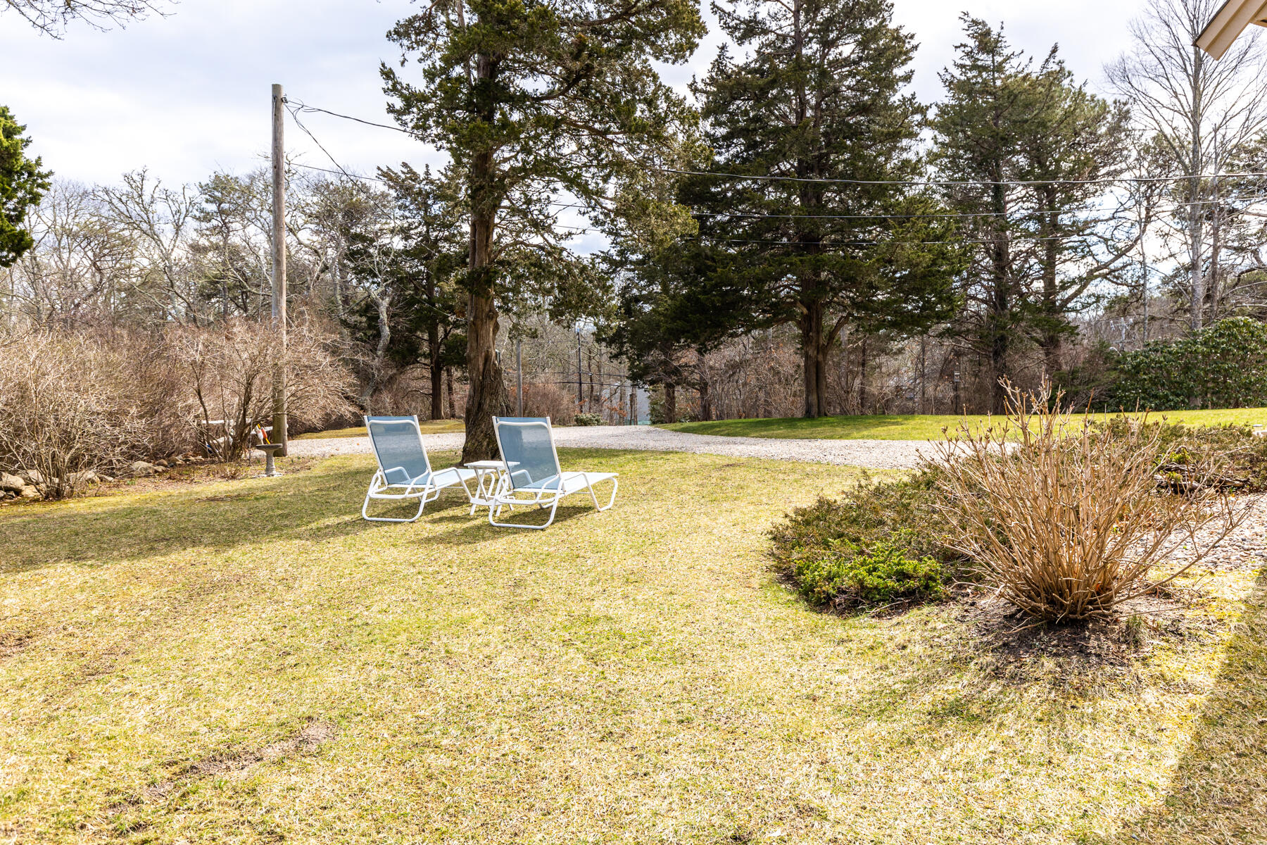 84 Beach Road Orleans, MA 02653 - Photo 32 of 45 a view of a swimming pool with an outdoor space and seating area