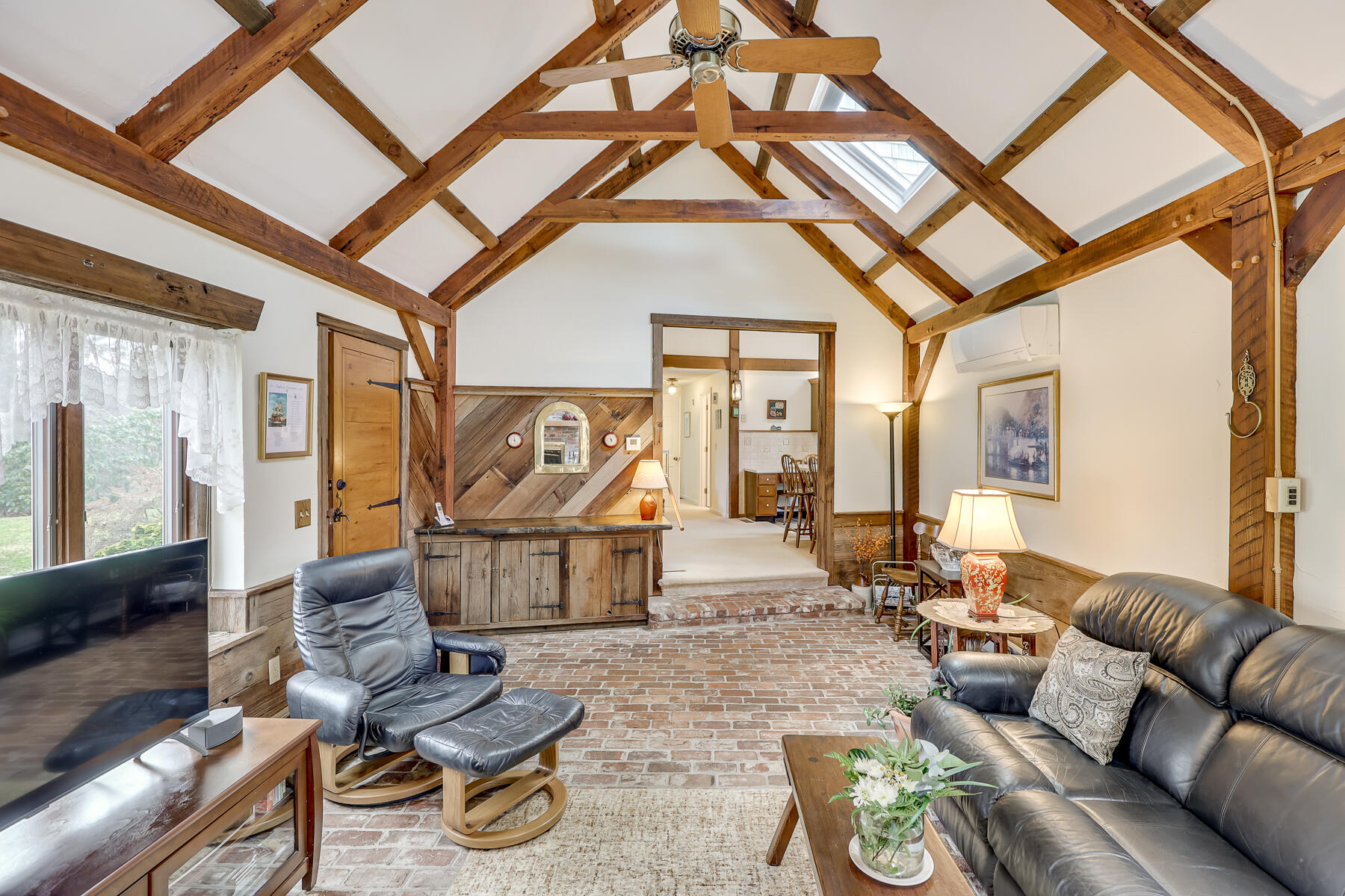 84 Beach Road Orleans, MA 02653 - Photo 8 of 45 a living room with furniture and wooden floor